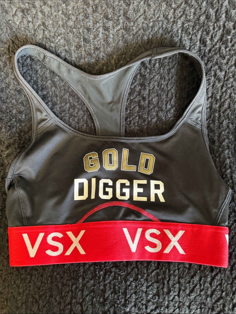 VSX Black Sports Bra with Red Elastic and Gold Lettering